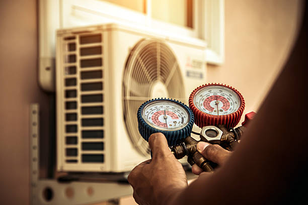 Professional Ductwork Repair technician working in Weston, MA